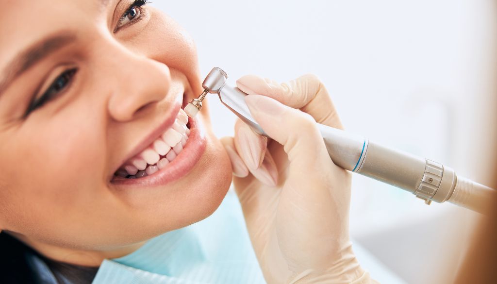 Professional teeth cleaning in Dubai, showcasing dental cleaning techniques to remove stains from teeth using dental scaling