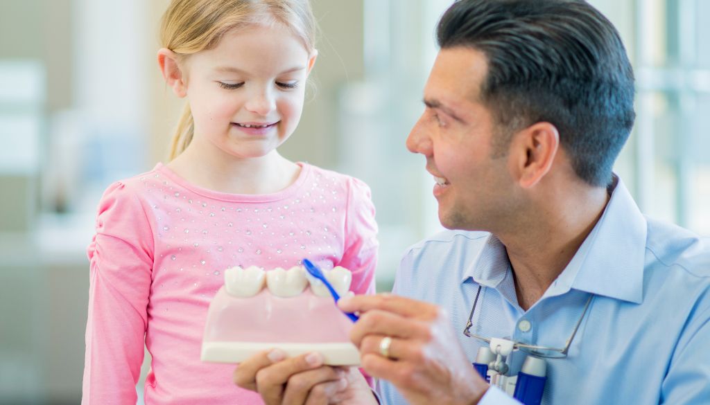 Pediatric dental care with a pedia dentist addressing pediatric tooth decay for childrens dental health at a kiddies dentist.