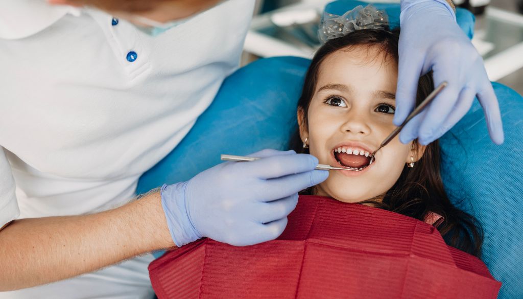 Pediatric dental care with a pedia dentist addressing pediatric tooth decay for childrens dental health at a kiddies dentist.